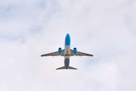 Madrid, Spain; 09-25-2021: Boeing 737 model airplane, from Amazon Air airline, seen with a low angle view shortly after taking off with a cloudy sky behindのeditorial素材