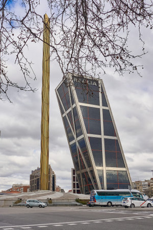 Madrid, Spain; 01-25-2022: Obelisk de la Caja, aka Obelisk of Calatrava and one of the Kio towers in the famous Plaza de Castilla in Madridのeditorial素材