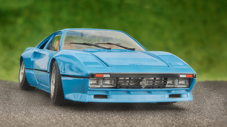Madrid, Spain; 05-31-2022: Model of a sky blue Ferrari GTO car seen from the side on the asphalt...