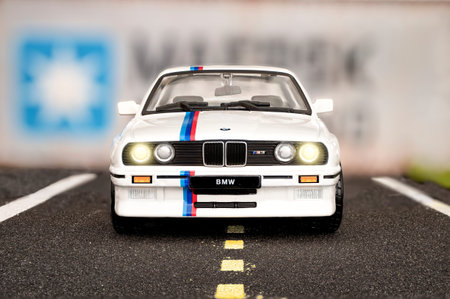 Madrid, Spain; 10-12-2023: Front view of scale model of a white Bmw M3 E30 sports car from the year...