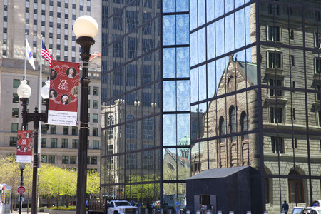 Trinity Church reflecting on John Hancock tower in Copley Square Bostonのeditorial素材