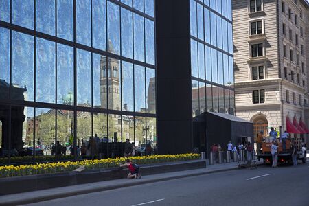 Trinity Church reflecting on John Hancock tower in Copley Square Bostonのeditorial素材