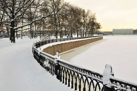 The granite embankment covered with snow, St. Petersburgの写真素材