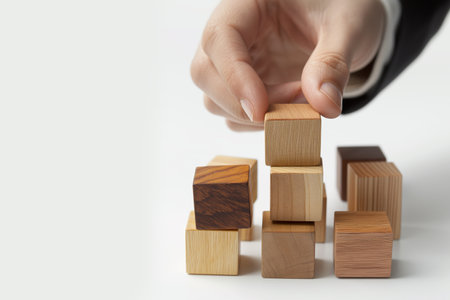 Businesswoman arranging wood block stacking as step stair on white background generative aiの素材