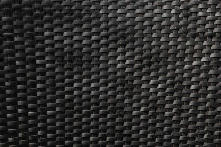 Brown woven plastic chairの写真素材