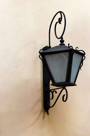 Black Lamp on the Brown Wallの写真素材
