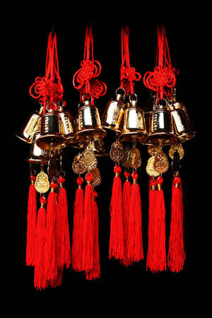 Many Chinese lucky bells in Black backgroundの写真素材