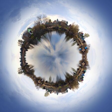Spherical form landscape. Collage method. Village on the Lakeの写真素材