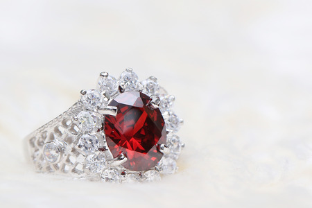 red gemstone on diamond ringの写真素材
