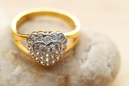 Heart diamond on gold ringの写真素材