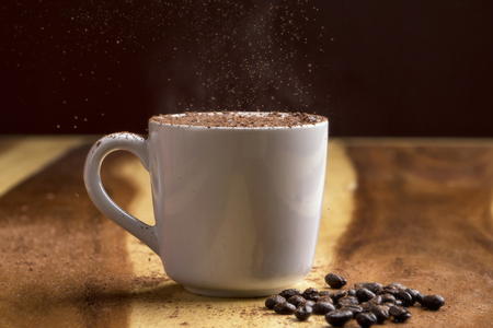 hot coffee mocha on wood floorの写真素材