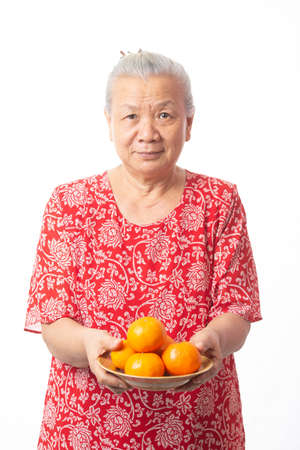 Old woman and Chinese new year.の写真素材