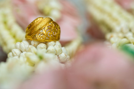Gold ring, Wedding ring, Diamond ring on the flowers.