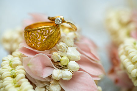 Gold ring , Wedding ring,Diamond ring on the flowers.の写真素材