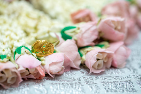 Gold ring , Wedding ring,Diamond ring on the flowers.