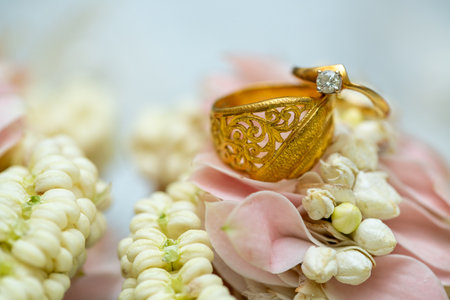 Gold ring , Wedding ring,Diamond ring on the flowers.の写真素材