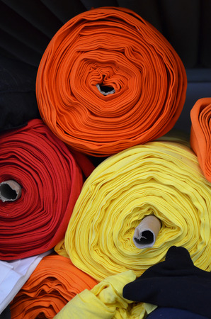 rolls of cloth on the rackの写真素材