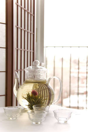A teapot of artisan blooming teaの写真素材