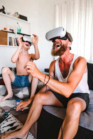 Caucasian father and son playing a game using VR Headsets.AI Generatedの写真素材