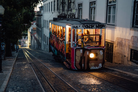 Lisbon, Portugal , July 12 2023,Historic Elevador da Bica with people, electric elevator in Lisbon, Portugalのeditorial素材