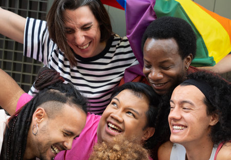 Close up of multicultural people smiling and hugging each other. Embracing diversity.の写真素材