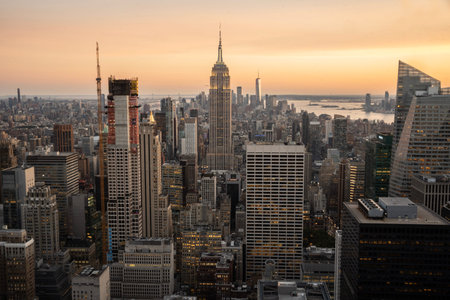 Aerial view of mid Manhattan cityscape seen from top of the rock viewpoint at sunset.