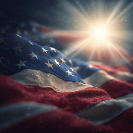 American flag showing stars and stripes with bright sun shining over the fabric
