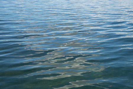 Background from the blue expanse of lake with small waves.