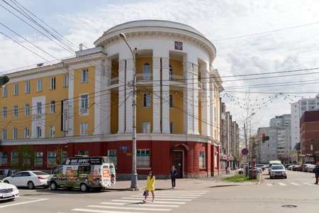 View of the building built in the period of Stalin from the intersection of Karatanov Street and Prospekt Mira in the old center of Krasnoyarsk. Kranoyarsk region. Russia.のeditorial素材