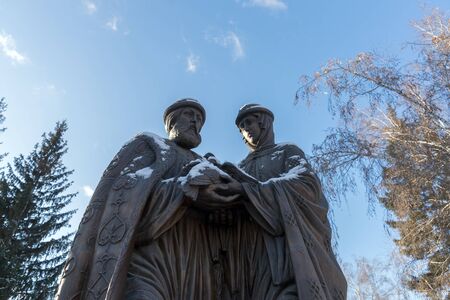 Monument to saints Peter and Fevronia - the patrons of marriage and family, as well as the symbols of love and fidelity against the blue sky. Novosibirsk. Russia.のeditorial素材