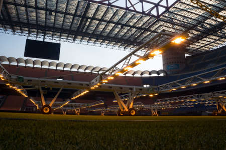 Milan, San Siro. Italy A special system of additional lighting sports natural lawn MLR illuminates the grass at the stadium Giuseppe Meazza or San Siro, built in 1925.のeditorial素材