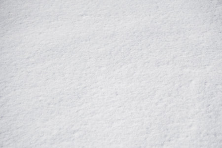 Natural background from white, freshly fallen snow.