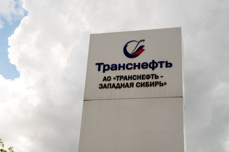 KrasnoyarskThe shield of the branch of the monopoly state operator of the main oil pipelines of Russia with the logo and name in Russian - the oil pipeline department of JSC Transneft-Western Siberia.のeditorial素材