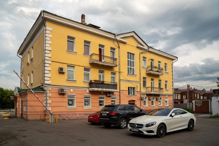 Krasnoyarsk, Krasnoyarsk Region, RF - July 19, 2021: Cars are parked in the courtyard of a...