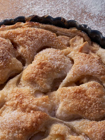 A puff pastry covered lightly sugared apple tartの写真素材