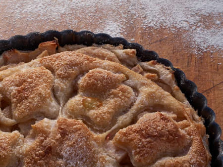 A puff pastry covered lightly sugared apple tartの写真素材