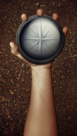 HAnd holding compass finding directionの写真素材