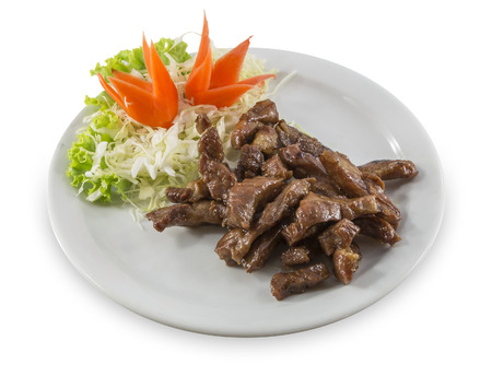 baked meat ostrich on white diskの写真素材