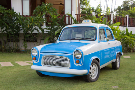 A blue taxi old car of thailandの写真素材