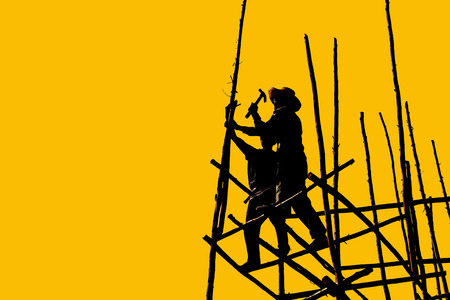 Builders are building a wooden stand cutoutの写真素材