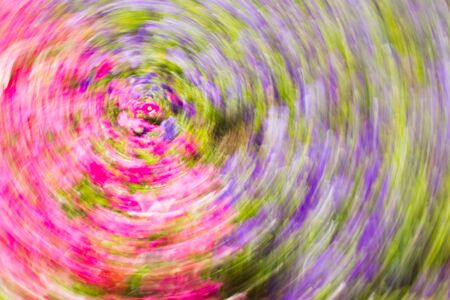 Abstract colorful composition with pink, lilac, yelow and white strokes effect rotationの写真素材