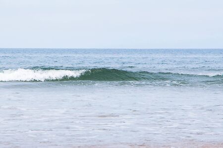 ocean waves breaking natural backgroundの写真素材
