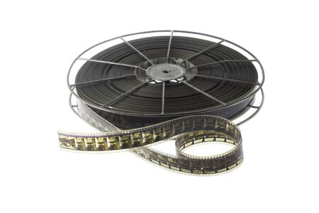 Old 35 mm motion picture film reel, isolated on white backgroundの写真素材