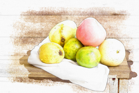 still life photography with apple, oranges and mango on woodの写真素材