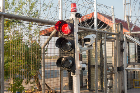 surveillance protection camera and traffic lightの写真素材