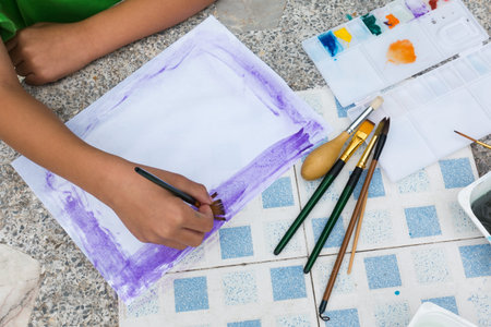little cute boy painting with water color, lifestyle people conceptの写真素材