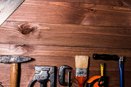 Set of hand tools on a wooden table