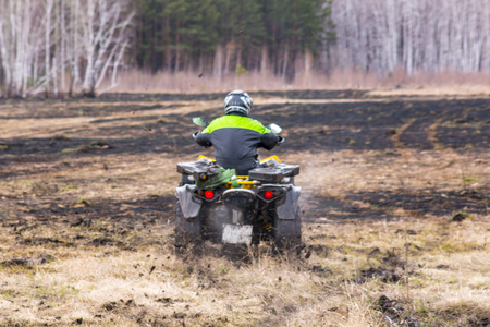 ATV at the competitions in the Siberian city of Omsk in April 2017. Races in impassable terrainの写真素材