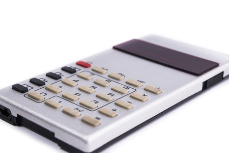 Old silver calculator made by USSR with red display on white background