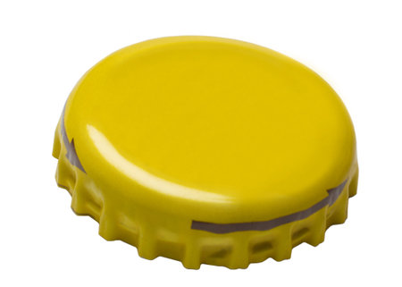 Yellow metal cork from a bottle of soda water on a white background